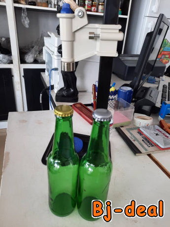 Main image of Capsuleuse bouteilles Heineken vides capsules